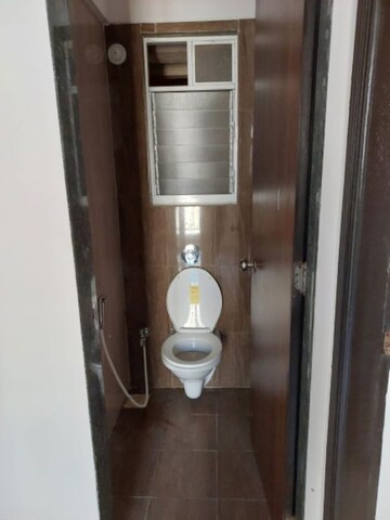 Bathroom in 1 BHK Apartment at KIPL Morya, Kasarvadavali – for Rent