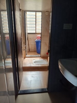 Bathroom in 2 BHK Apartment at Susheel Meadows Apartment, New Panvel – for Rent