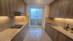 Kitchen in 4 BHK Apartment at Ambience Creacions, Sector 22 – for Sale