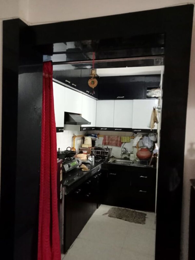 Kitchen, aditya-urban-homes 1 Bedroom 585 Sq.Ft. Apartment In Shahpur Bamheta Ghaziabad 9819548