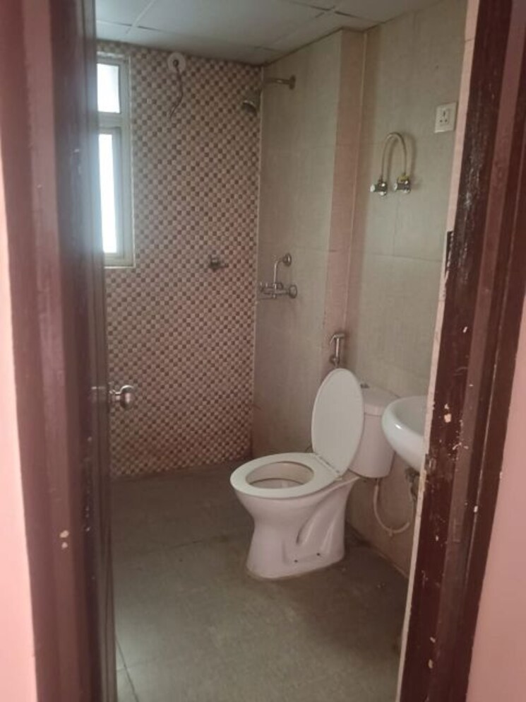 Bathroom, aditya-world-city 2 Bedroom 925 Sq.Ft. Apartment In Shahpur Bamheta Ghaziabad 9417461