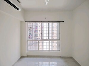 Room in 2 BHK Apartment at Lodha Amara, Kolshet Road – for Sale