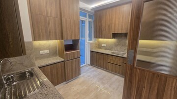 Kitchen in 3 BHK Apartment at Ambience Creacions, Sector 22 – for Sale