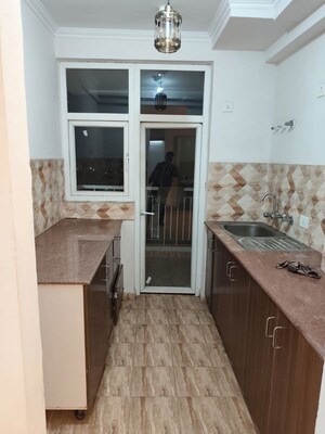 Kitchen in 2 BHK Apartment at Gaur City 2 - 14th Avenue, Sector 16c Greater Noida – for Rent