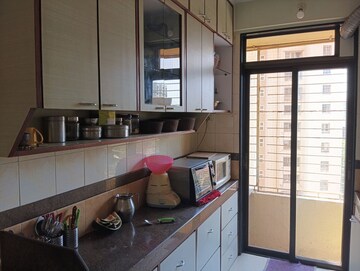 Kitchen in 2 BHK Apartment at Rustomjee Riviera, Malad West – for Rent