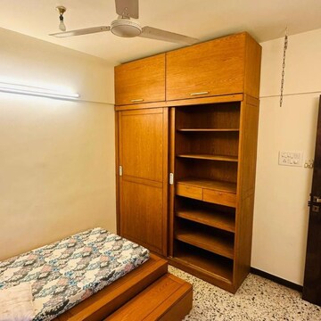 Bedroom in 2 BHK Apartment at Lokhandwala Complex – for Rent