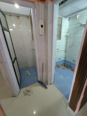 Bathroom in 4 BHK Apartment at Bredco Hill View Park, Kandivali East – for Rent