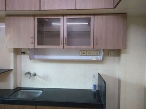 Kitchen in 4 BHK Apartment at Bredco Hill View Park, Kandivali East – for Sale