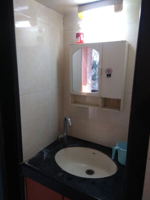 Bathroom in 4 BHK Apartment at Bredco Hill View Park, Kandivali East – for Sale