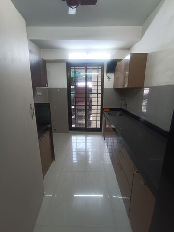 Kitchen in 3 BHK Apartment at Acme Avenue, Kandivali West – for Rent