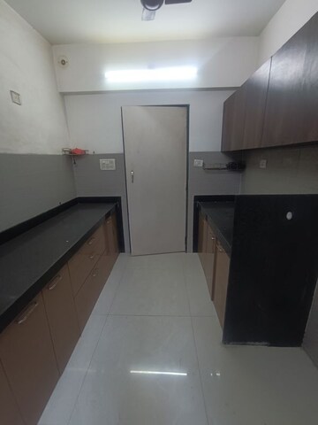 Kitchen in 3 BHK Apartment at Acme Avenue, Kandivali West – for Rent