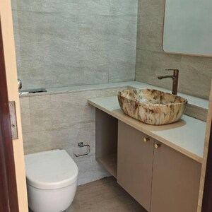 Bathroom in 4 BHK Apartment at Omkar 1973, Century Bazar – for Rent