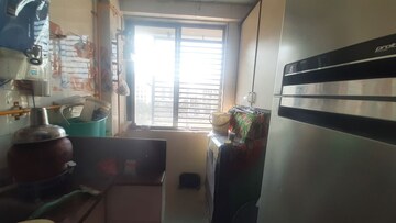 Kitchen in 2 BHK Apartment at Sahaj Solarium, Vasna – for Rent