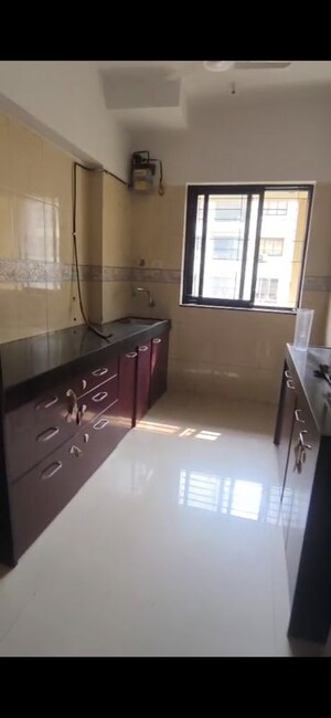 Kitchen in 2 BHK Apartment at K Raheja Palm Spring, Malad West – for Rent