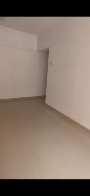 Living Room in 2 BHK Apartment at K Raheja Palm Spring, Malad West – for Rent