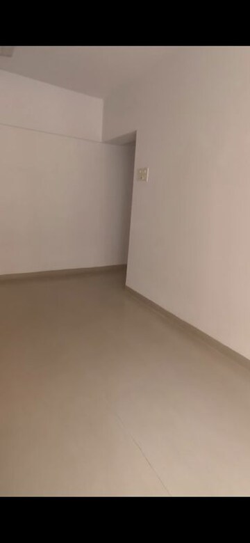 Living Room in 2 BHK Apartment at K Raheja Palm Spring, Malad West – for Rent