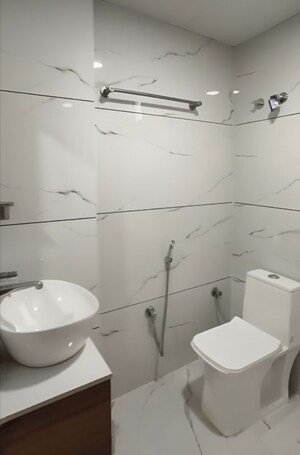 Bathroom in 4 BHK Apartment at Mansarovar – for Rent