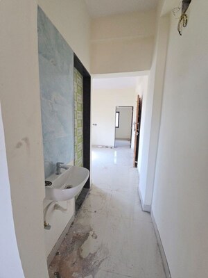 Building Lobby in 1 BHK Apartment at Wadgaon Sheri – for Rent