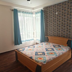 Bedroom in 3 BHK Apartment at Bhartiya Nikoo Homes, Kannur – for Rent