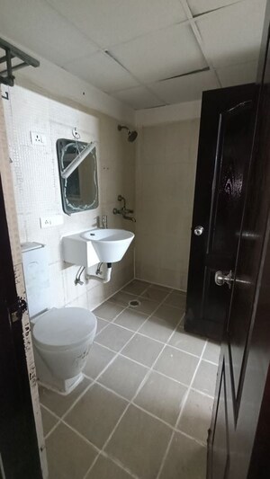 Bathroom in 3 BHK Apartment at Aditya Celebrity Homes, Sector 76 – for Rent