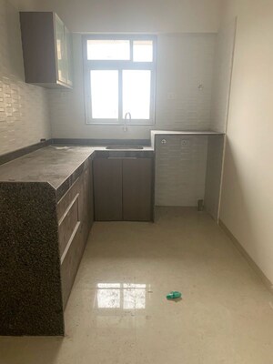 Kitchen in 1.5 BHK Apartment at Chandiwala Pearl Regency, Andheri West – for Rent