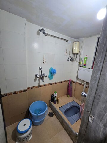 Bathroom in 1 BHK Apartment at Mahadev Samarth Garden, Bhandup West – for Rent