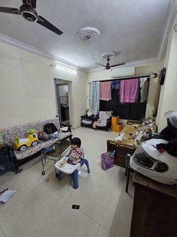 Living Room in 1 BHK Apartment at Mahadev Samarth Garden, Bhandup West – for Rent