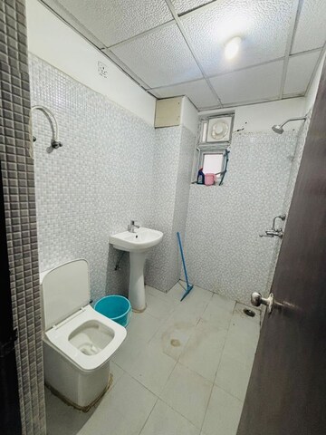 Bathroom in 2 BHK Apartment at Urban Axis Urban Woods, Sushant Golf City – for Rent