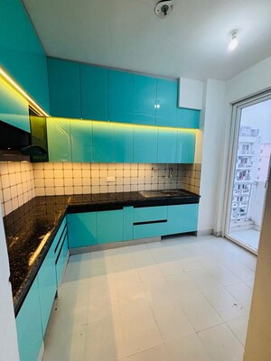 Kitchen in 2 BHK Apartment at Urban Axis Urban Woods, Sushant Golf City – for Rent