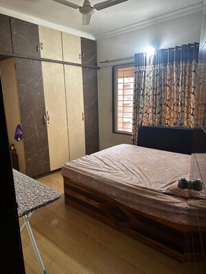 Bedroom in 2 BHK Apartment at GK Rose Woods, Pimple Saudagar – for Rent