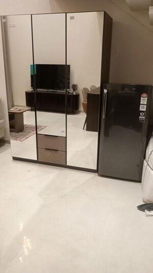 Living Room in Studio Apartment at M3M Corner Walk, Sector 74 – for Rent