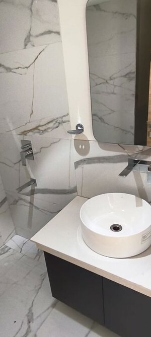 Bathroom in Studio Apartment at M3M Corner Walk, Sector 74 – for Rent