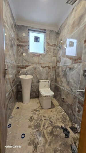 Bathroom in 1 BHK Builder Floor at Chattarpur – for Rent