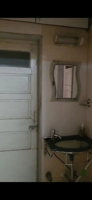 Bathroom in 1 BHK Apartment at Dhawalgiri Apartments, Goregaon East – for Rent