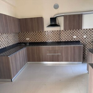 Kitchen in 4 BHK Apartment at Adani Oyster Grande Phase 2, Sector 102a – for Rent