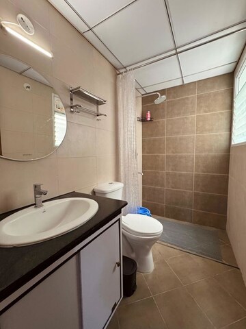 Bathroom in 1 BHK Apartment at Puravankara Adora De Goa, Chicalim – for Rent