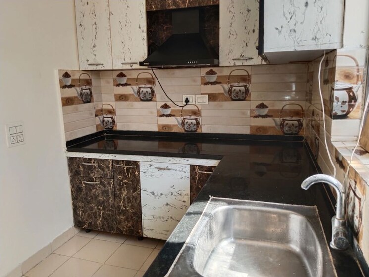 Kitchen, unitech-uniworld-gardens-2 3 Bedroom 1745 Sq.Ft. Builder Floor In Sector 47 Gurgaon 9826643