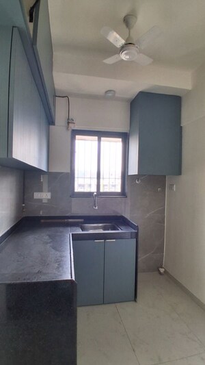 Kitchen in 1 BHK Apartment at Atharva Om Gautam Residency, Malad East – for Rent