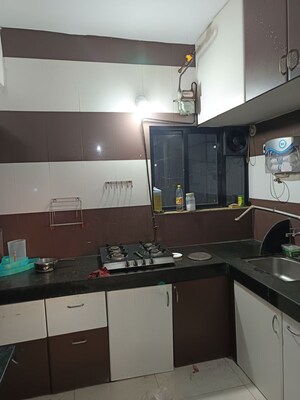 Kitchen in 2 BHK Apartment at Kumar Periwinkle, Kharadi – for Rent
