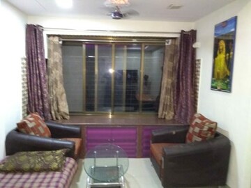 Living Room in 1 BHK Apartment at Planet Powai CHS, Powai – for Rent
