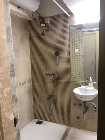 Bathroom in 2 BHK Apartment at Dedhia Palatial Height, Powai – for Rent