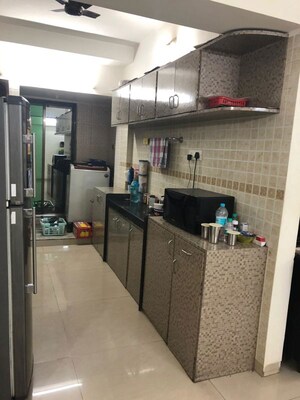 Kitchen in 2 BHK Apartment at Dedhia Palatial Height, Powai – for Rent