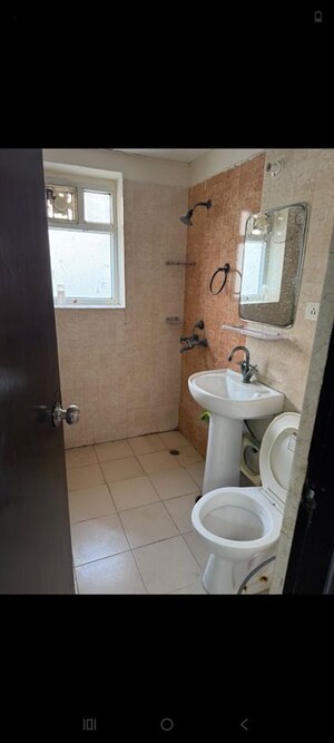 Bathroom in 3 BHK Apartment at Antriksh Golf View, Sector 78 – for Rent