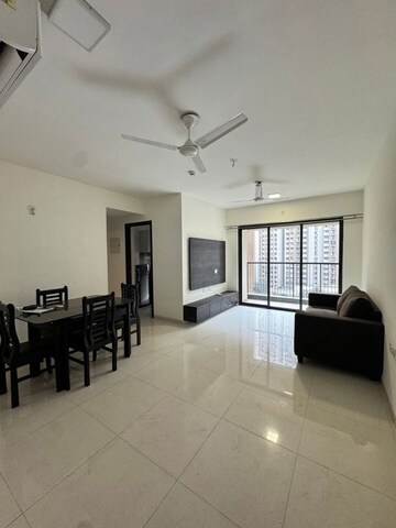 Living Room in 2 BHK Apartment at Lodha Splendora, Ghodbunder Road – for Rent