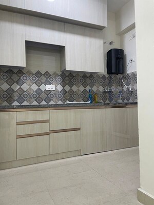 Kitchen in 2 BHK Apartment at Signature The Millennia 2, Sector 37d – for Rent