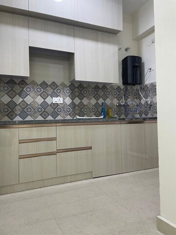Kitchen in 2 BHK Apartment at Signature The Millennia 2, Sector 37d – for Rent