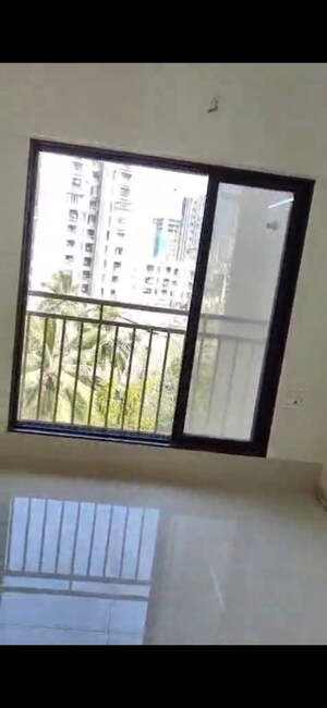 Room in 2 BHK Apartment at Oxford Navrang Crystal, Goregaon West – for Rent