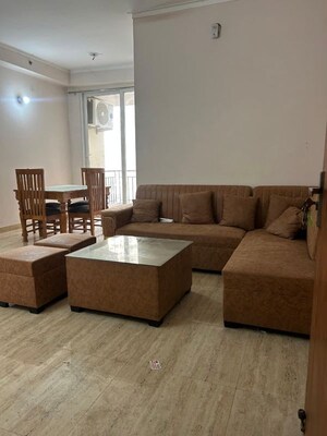 Living Room in 2 BHK Apartment at Amrapali Golf Homes, Haibatpur – for Rent