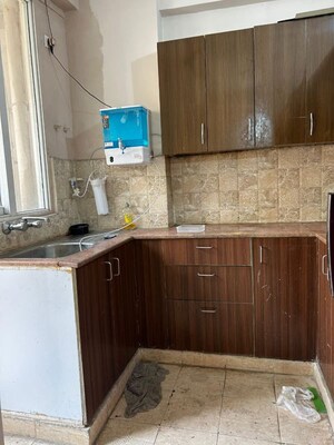 Kitchen in 2 BHK Apartment at Amrapali Golf Homes, Haibatpur – for Rent