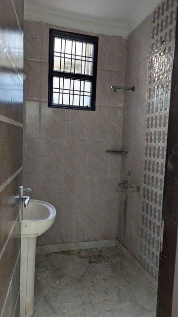 Bathroom in 4 BHK Builder Floor at Green Fields Colony – for Rent